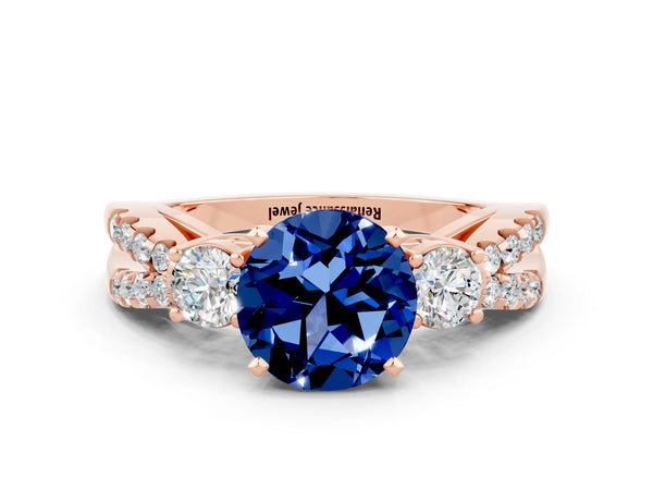 Rose gold Round Cut Blue Sapphire Three-Stone Ring with Pavé Split Shank and Four-Prong Setting