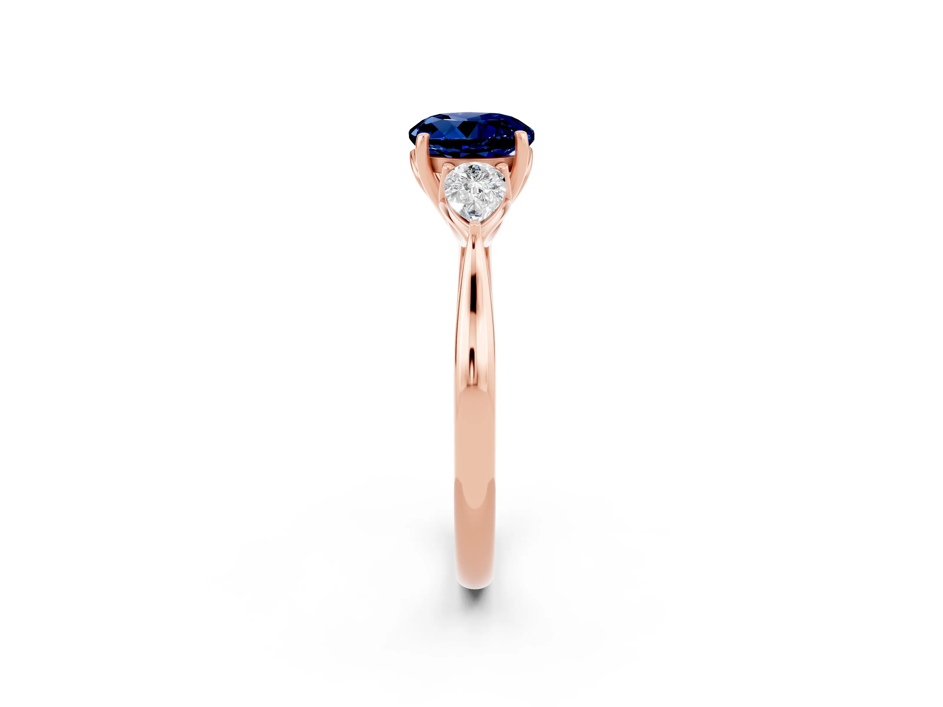 Rose gold Round Cut Blue Sapphire Three-Stone Ring with Pear Side Stones and Four-Prong Setting_14