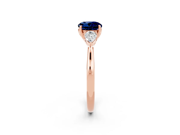 Rose gold Round Cut Blue Sapphire Three-Stone Ring with Pear  Side Stones and Prong Setting