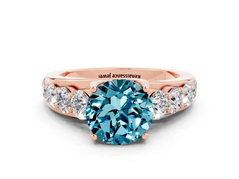 Rose gold Round Cut Blue Topaz Engagement Ring with Pavé Band and Four-Prong Setting