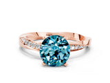 Rose gold Round Cut Blue Topaz Engagement Ring with Side Stone Accents and Four-Prong Setting_27