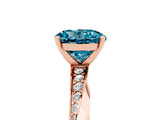 Rose gold Round Cut Blue Topaz Engagement Ring with Side Stone Accents and Four-Prong Setting_32