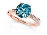 Rose gold Round Cut Blue Topaz Engagement Ring with Side Stone Accents and Four-Prong Setting_61