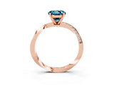 Rose gold Round Cut Blue Topaz Engagement Ring with Side Stone Accents and Four-Prong Setting_63