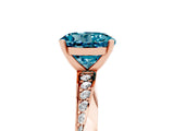 Rose gold Round Cut Blue Topaz Engagement Ring with Side Stone Accents and Four-Prong Setting_65