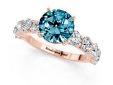 Rose gold Round Cut Blue Topaz Prong Setting with Side Stones on a Pave Band_1