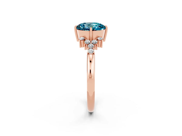 Rose gold Round Cut Blue Topaz Ring with Side Stones and Four-Prong Setting