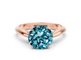 Rose gold Round Cut Blue Topaz Solitaire Engagement Ring with Cathedral Setting and Four-Prong Mount_24