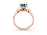 Rose gold Round Cut Blue Topaz Solitaire Engagement Ring with Cathedral Setting and Four-Prong Mount_75