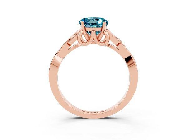 Rose gold Round Cut Blue Topaz Solitaire Engagement Ring with Celtic Knot Band and Four-Prong Setting
