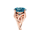 Rose gold Round Cut Blue Topaz Solitaire Engagement Ring with Celtic Knot Band and Four-Prong Setting_5