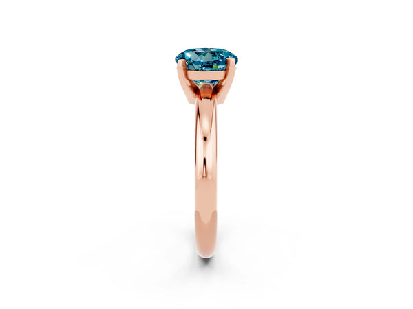 Rose gold Round Cut Blue Topaz Solitaire Engagement Ring with Round Band and Four-Prong Setting