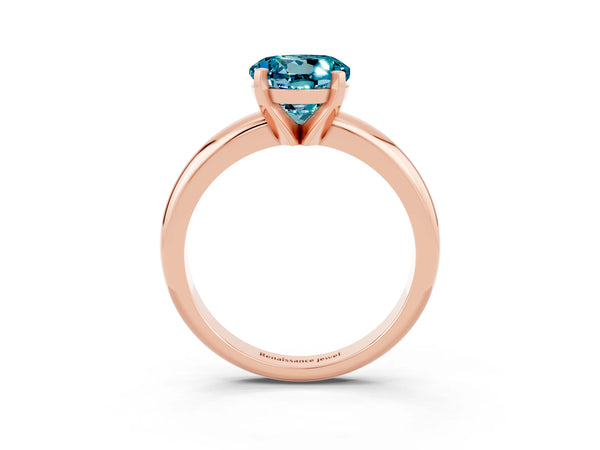 Rose gold Round Cut Blue Topaz Solitaire Engagement Ring with Round Band and Four-Prong Setting