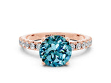 Rose gold Round Cut Blue Topaz Solitaire Pavé Band with Four-Prong Setting
