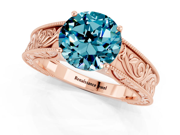 Rose gold Round Cut Blue Topaz Solitaire Ring with Engraved Band and Four-Prong Setting