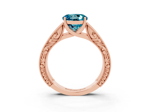 Rose gold Round Cut Blue Topaz Solitaire Ring with Engraved Band and Four-Prong Setting