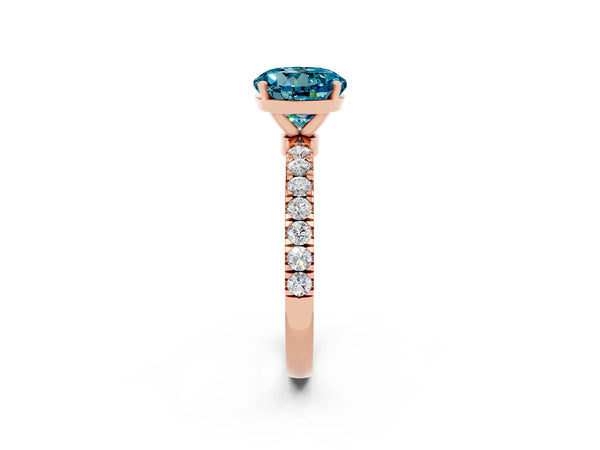 Rose gold Round Cut Blue Topaz Solitaire Ring with Pavé Accents and Four-Prong Setting