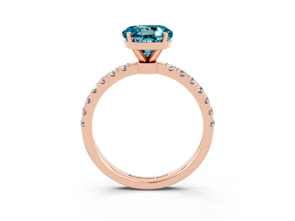 Rose gold Round Cut Blue Topaz Solitaire Ring with Pavé Accents and Four-Prong Setting