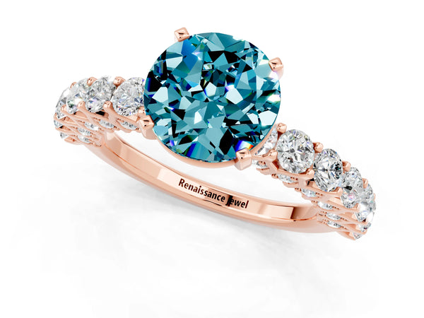 Rose gold Round Cut Blue Topaz Solitaire Ring with Shared Prong Pavé Band and Four-Prong Setting