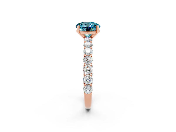 Rose gold Round Cut Blue Topaz Solitaire Ring with Shared Prong Pavé Band and Four-Prong Setting
