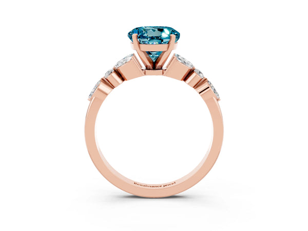 Rose gold Round Cut Blue Topaz Solitaire Ring with Side Stones and Four-Prong Setting