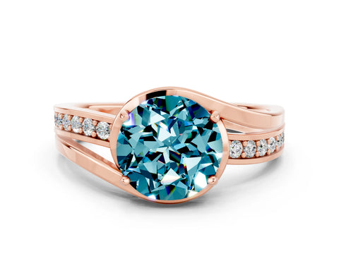 Rose gold Round Cut Blue Topaz Solitaire Ring with Split Shank and Prong Setting