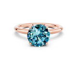 Rose gold Round Cut Blue Topaz Solitaire Ring with Thin Band and Four-Prong Setting_12