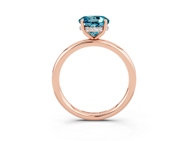 Rose gold Round Cut Blue Topaz Solitaire Ring with Thin Band and Four-Prong Setting