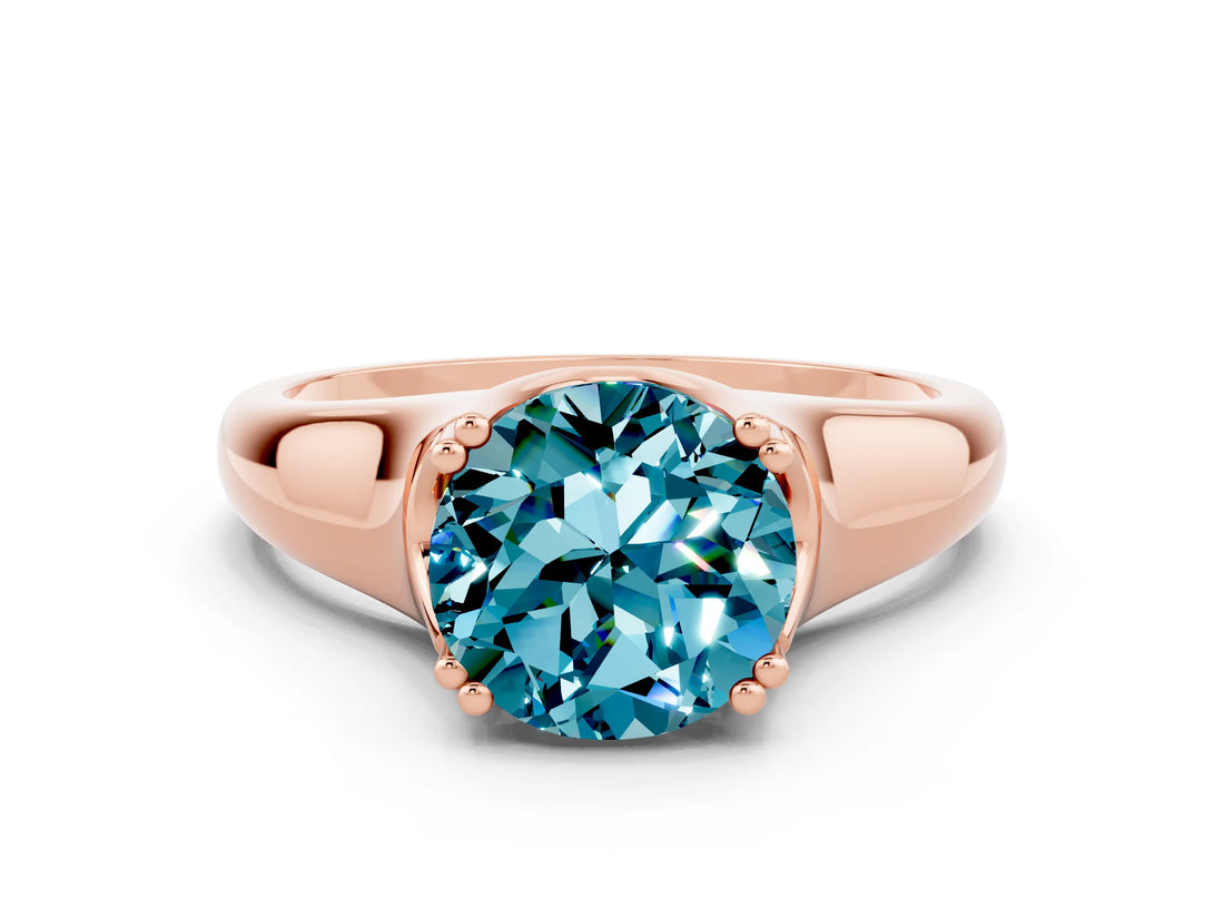 Rose gold Round Cut Blue Topaz Solitaire Ring with Wide Band and Prong Setting