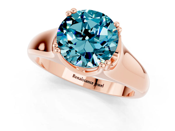 Rose gold Round Cut Blue Topaz Solitaire Ring with Wide Band and Prong Setting