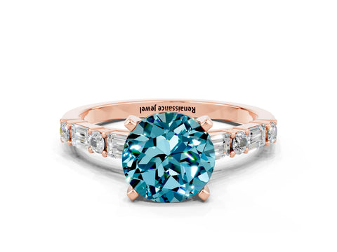 Rose gold Round Cut Blue Topaz Solitaire with Side Baguettes and Channel Set Band