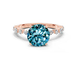 Rose gold Round Cut Blue Topaz Solitaire with Side Stones on a Pavé Band and Four-Prong Setting_12