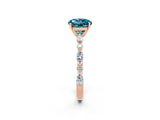 Rose gold Round Cut Blue Topaz Solitaire with Side Stones on a Pavé Band and Four-Prong Setting_14