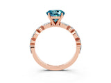 Rose gold Round Cut Blue Topaz Solitaire with Side Stones on a Pavé Band and Four-Prong Setting_15