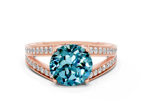 Rose gold Round Cut Blue Topaz Split Shank Ring with Pavé Band and Four-Prong Setting