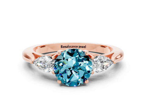 Rose gold Round Cut Blue Topaz Three-Stone Ring with Pear Side Stones and Four-Prong Setting_12