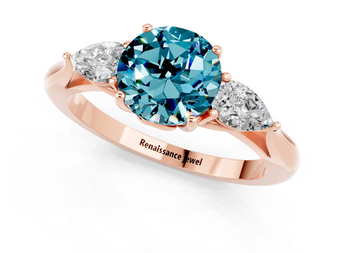 Rose gold Round Cut Blue Topaz Three-Stone Ring with Pear Side Stones and Four-Prong Setting_13