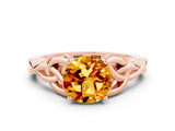Rose gold Round Cut Citrine Solitaire Engagement Ring with Celtic Knot Band and Four-Prong Setting