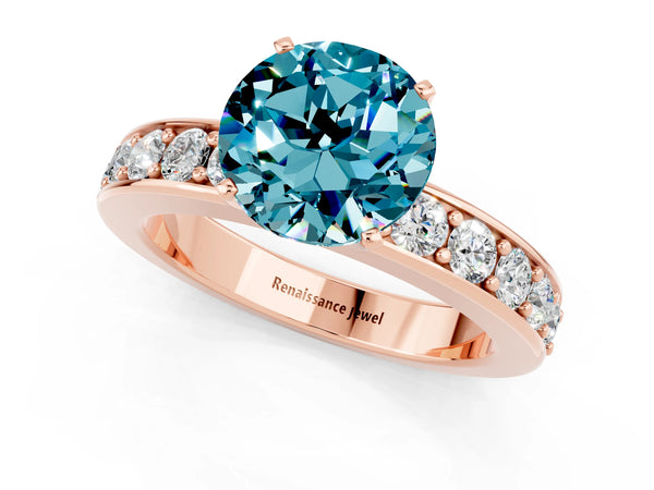 Rose gold Round Cut Blue Topaz Engagement Ring with Channel Set Round Band and Prong Setting