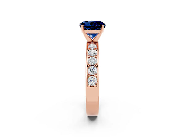 Rose gold Round Cut Blue Sapphire Engagement Ring with Channel Set Round Band and Prong Setting