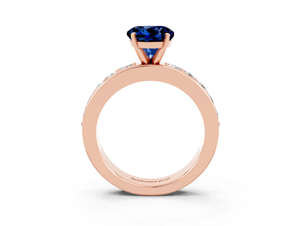 Rose gold Round Cut Blue Sapphire Engagement Ring with Channel Set Round Band and Prong Setting