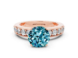 Rose gold Round Cut Cut Channel Set Diamond Engagement Ring with Four-Prong Setting