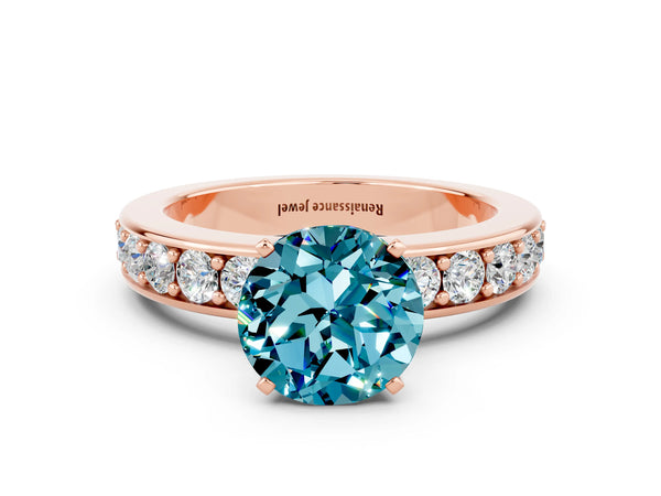 Rose gold Round Cut Blue Topaz Engagement Ring with Channel Set Round Band and Prong Setting