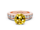 Rose gold Round Cut Cut Channel Set Diamond Engagement Ring with Four-Prong Setting