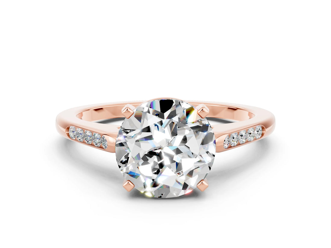 Rose gold Round Cut Cut Channel Set Solitaire Engagement Ring with Four-Prong Setting
