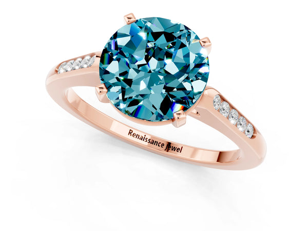 Rose gold Round Cut Blue Topaz Solitaire Ring with Channel Set Round Band and Prong Setting