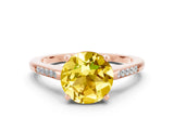 Rose gold Round Cut Cut Channel Set Solitaire Engagement Ring with Four-Prong Setting