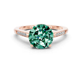 Rose gold Round Cut Cut Channel Set Solitaire Engagement Ring with Four-Prong Setting