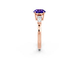 Rose gold Round Cut Cut Diamond Ring with Tapered Baguette Side Stones in Four-Prong Setting_2