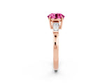 Rose gold Round Cut Cut Diamond Ring with Tapered Baguette Side Stones in Four-Prong Setting_2